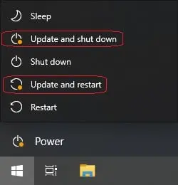 The Windows start menu showing the Power menu with a pending update.